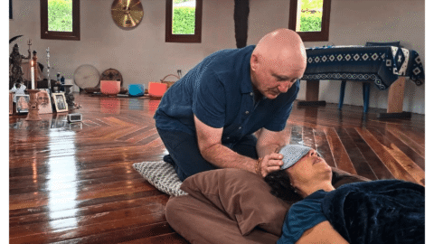 Alan Waugh guiding a breathwork session with Fawn in the Maloka.